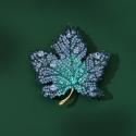 Luxusní brož v podobě listu osázena zirkony
